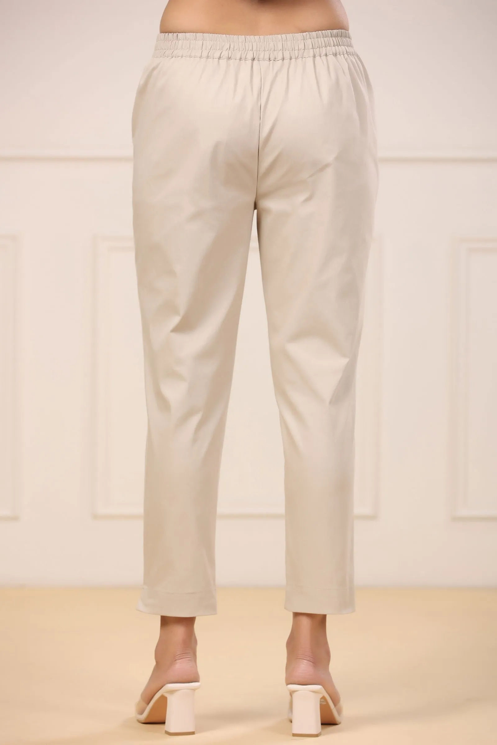 Jashvi Beige Spendex Solid Slim Fit Pants With Partially Elasticated Waistband